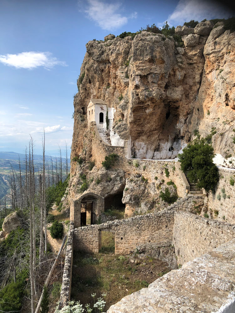 Monastery church set into a cliff face on Mount Apesas.