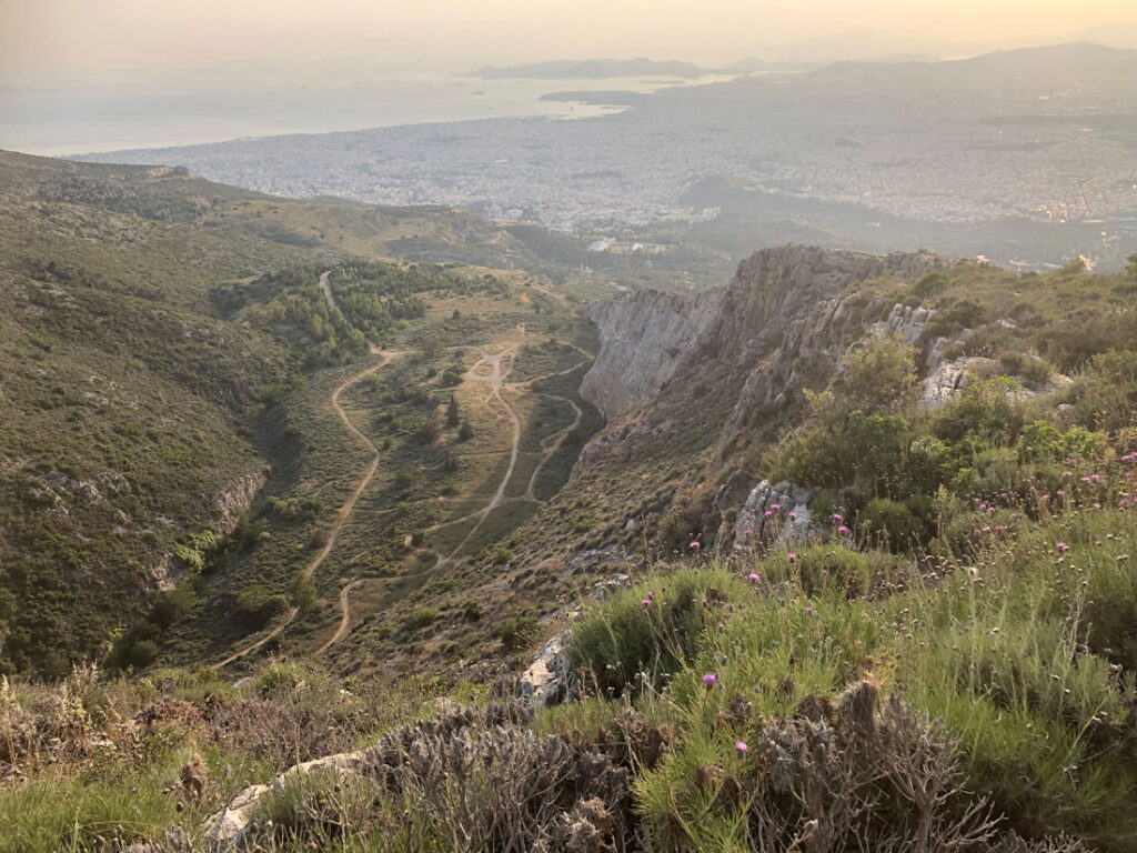 Mountain slope with views down to paths on the floor of abandoned quarry.